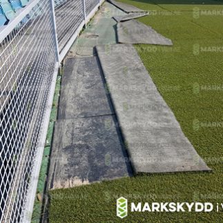 mats underneath fake grass